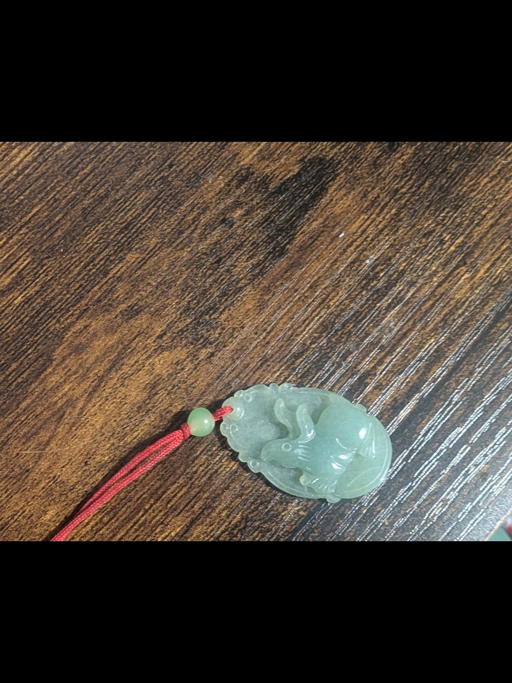 Carved Green Jade Rabbit Pendant on Red Cord